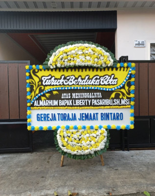 Papan Bunga Duka di Sigulanggulang
